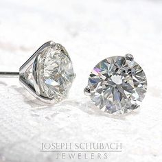 3 Prong Martini Stud Earrings with friction backs. Earrings will arrive assembled. Other back options are available. Popular stone choices include mined diamonds, lab-grown diamonds and moissanite, including Joseph Schubach exclusive Radiance® Moissanite. These timeless earrings are available in most stone qualities, sizes and stone types. Contact us for information. Diamond Cut Diamond Earrings, Fine Jewelry Diamond Cut Round Stone Earrings, Diamond Earrings With Prong Setting, Gia Certified Round Lab Grown Diamond Earrings, Fine Jewelry Diamond Earrings With Round Stone, Diamond Cut Earrings Fine Jewelry, Fine Jewelry Lab-grown Diamond Round Cut Earrings, Round Cut Lab Grown Diamond Earrings, Gia Certified Round Cut Lab Grown Diamond Earrings