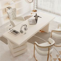 a white desk with two chairs and a laptop