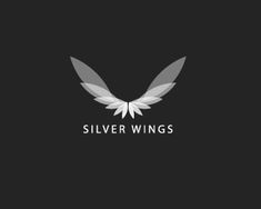 silver wings logo on a black background