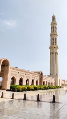 a tall clock tower towering over a city