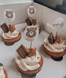 cupcakes with teddy bears and chocolate on top