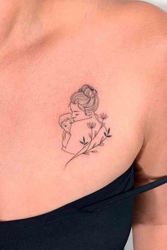 a woman with a tattoo on her shoulder