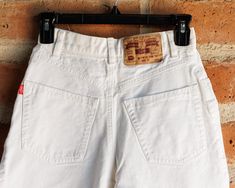 Great, seemingly brand new, pair of white high waist denim jeans. Waist: 24" Rise: 12.5" Inseam: 27.5" Outside Length: 38" High-rise White Jeans With Belt Loops, High Rise White Jeans With Belt Loops, White High Rise Jeans With Belt Loops, Vintage High Rise White Bottoms, Vintage High Rise White Jeans, Vintage High-rise White Jeans, Vintage White Denim Jeans, Jeans Western, White Denim Jeans