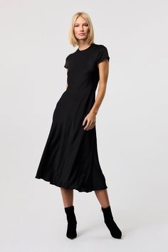 Soft, sleek, and effortlessly elegant, the Luciana black silk dress is the perfect choice for almost any occasion. This short sleeve dress is cut on the bias, allowing the silky satin fabric to drape beautifully for a flattering silhouette. Ideal for layering with knits, jackets, or coats, this midi dress transitions seamlessly from day to night, offering timeless style and sophistication for any setting. Satin Black Dress, Black Silk Midi Dress, Midi Dres, Perfect Fall Outfit, Black Silk Dress, Casual Day Dresses, Tie Front Dress, Black Satin Dress, Evening Gowns Elegant