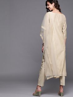 Buy magnificent beige embroidered kurta with pants and dupatta. for women which is crafted from chanderi cotton fabric with beautiful trendy style and pattern. Elegant Cotton Anarkali Set With Gota Work, Eid Gota Work Churidar, Cream Cotton Palazzo Set For Wedding, Bollywood Style Cream Palazzo Set With Straight Kurta, Diwali Cream Palazzo Set With Straight Kurta, Festive Cream Cotton Silk Churidar, Unstitched Cotton Silk Palazzo Set, Chanderi Churidar With Sheer Dupatta And Straight Kurta, Cotton Silk Churidar With Sheer Dupatta And Straight Kurta