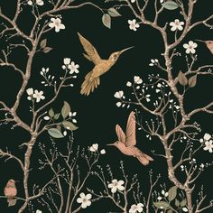 two birds are flying over the branches of trees and white flowers on a black background