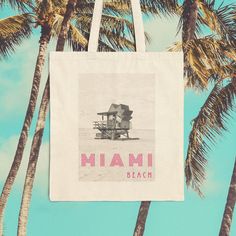 Stylish 100% cotton bag in natural color comes in one size - 15" x 16" - perfect for everyday wear, durable and will last for years. This iconic vintage photo of Miami Beach is a classic. The bag features 20" handles (made from the same canvas), making it easy to carry for shopping and leisure time.  .: 100% cotton canvas .: Heavy fabric (12 oz/yd & 406.9 g/m) .: Sewn-in label Vintage Beach Tote Bag, Summer Tropical Tote Beach Bag, Cheap Tropical Beach Tote Bag, Eco-friendly Palm Leaf Tote Beach Bag, Tropical Beach Tote Bag, Boho Tote Bag, Boho Tote, Photo Vintage, Beach Tote