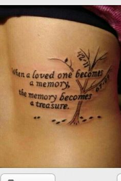 a woman's stomach with a tattoo saying, when a loved one becomes a memory, the memory becomes a treasure