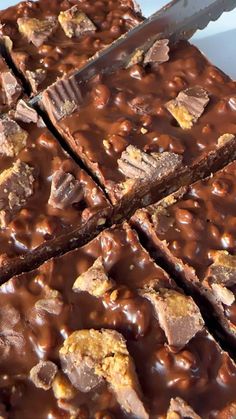 chocolate fudge brownies cut into squares with a knife