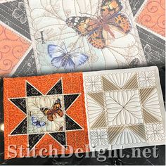 two quilts with butterflies on them sitting next to each other in front of an orange and black background