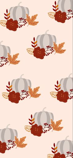 a pattern with pumpkins, leaves and acorns on a peach colored background