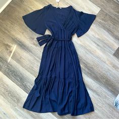 Brand New With Tags And Unworn. Elegant And Silky Maxi Dress In Navy Blue. Blue Belted Maxi Dress, Blue Short Sleeve Belted Midi Dress, Blue Belted Midi Dress With Short Sleeves, Blue Belted Short Sleeve Dress, Blue Belted V-neck Maxi Dress, Blue Belted Short Sleeve Maxi Dress, Casual Blue Belted Maxi Dress, Spring Blue Maxi Dress With Tie Waist, Blue Maxi Dress With Tie Waist For Spring