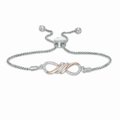 With eye-catching sparkle, this diamond infinity bolo bracelet draws all the right kinds of attention. Crafted in sterling silver and 10K rose gold, this entrancing style features a flame-inspired center design of polished rose gold ribbons highlighting a curved row of diamonds. Additional diamonds line silver loop details to complete this infinity symbol-shaped look. Radiant with 1/15 ct. t.w. of diamonds and a brilliant buffed luster, this wheat chain bracelet adjusts up to 9.5 inches in lengt Rose Gold Infinity Jewelry With Diamond Accents, Adjustable Rose Gold Diamond Bracelet Gift, Adjustable Infinity Fine Jewelry, Rose Gold Infinity Bracelet For Mother's Day, Infinity Rose Gold Bracelet For Mother's Day, Infinity Shaped Jewelry With Diamond Accents For Mother's Day, Mother's Day Infinity Jewelry With Diamond Accents, Silver Infinity Bracelets With Diamond Accents, Silver Infinity Diamond Bracelet For Anniversary