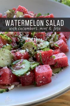 watermelon salad with cucumbers, mint and feta on a white plate