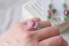 Handmade micro crochet sweet pea flower ring 14K gold plated ring with miniature crochet.  These ring are made with DMC cordonnet. They are lightweight and perfect for all-day wear. Ring are gold-plated brass from Korea. If you have any questions, please reach out to us via messages before purchasing. *All items are handmade and may contain minor imperfections & and a little color difference and variation between the picture and the actual item. But it doesn't make a big difference overall. Sinc Delicate Pink Flower Ring Gift, Delicate Pink Flower Ring As Gift, Delicate Pink Flower Ring For Gift, Adjustable Green Flower Ring Gift, Adjustable Green Flower Ring As Gift, Adjustable Green Flower Ring For Gift, Cute Flower Ring As Gift, Pink Dainty Flower Ring For Gift, Personalized Dainty Flower Ring Gift