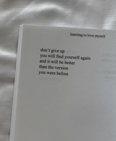 an open book with the words learning to love yourself on it