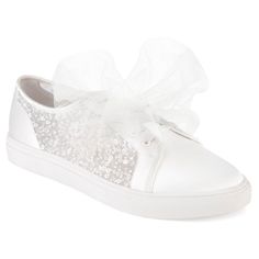 white sneakers with sequins and a bow on the side, all tied up