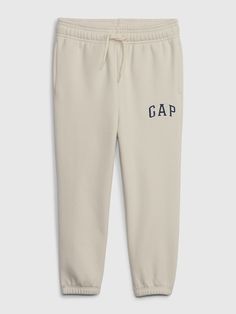 Soft cotton-blend joggers.  Elasticized waist with faux drawstring.  Front slant pockets.  Gap arch logo at thigh.  Elasticized hem.  Easy pull-on waist.  Easy through the hip and thigh.  Tapered leg. Gap Sweatpants With Elastic Waistband For Streetwear, Sporty Gap Sweatpants For Streetwear, Casual Jogging Bottoms With Logo Print, Sporty Logo Sweatpants For Streetwear, Casual Logo Pants For Streetwear, Sporty Cotton Sweatpants With Logo, Gap Pants With Elastic Waistband For Streetwear, Gap Streetwear Pants With Elastic Waistband, White Casual Bottoms With Logo Detail