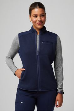 Pace Knit Vest Fabletics Navy female Activewear >> Scrubs >> Jackets >> Product Feed regular Zip Pockets Female Activewear, Navy Blue Scrubs, Soft Vest, Navy Vest, Scrub Jackets, Knit Vest, Active Wear For Women, Black And Navy, Scrubs