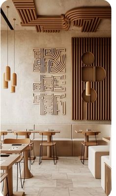 the interior of a restaurant with tables and chairs