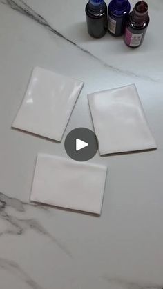 the video is showing how to use different paints on marble countertops and backsplashes