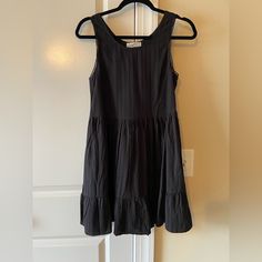 Black Flowy Mini Dress Almost Babydoll, Bought From Amazon, Still In Great Condition, Never Worn, Can Be Layered Black Mini Sundress With Ruffles, Black Ruffled Mini Sundress, Black Lined Mini Dress For Daywear, Fitted Black Sundress With Ruffles, Black Cotton Lined Dress, Black Lined Dress For Daywear, Black A-line Sundress For The Beach, Black Sundress With Ruffles, Black Ruffled Sundress