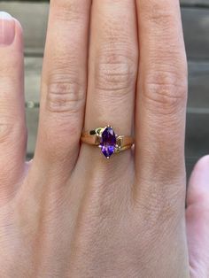 Total Weight: 3.3 grams Size: 7.25 Width: 1.2mm Amethyst: 10x4mm Condition: In great condition showing little wear with no damage. All gold has been thoroughly checked with an Olympus XRF spectrometer. It is guaranteed 14k gold.  All our jewelry is properly washed and disinfected to ensure customers get clean items with every order.  Returns accepted but may be subjected to a restock fee.  Please message with any questions:) Heirloom 14k Gold Solitaire Amethyst Ring, Purple Amethyst Ring With Prong Setting In 14k Gold, Heirloom Solitaire Purple Amethyst Ring, Classic Amethyst Ring Stamped 14k, Oval Amethyst Ring Stamped 14k, 14k Gold Purple Amethyst Ring, 14k Gold Amethyst Ring With Purple Gemstone, Purple 14k Gold Fine Jewelry Gemstones, Heirloom Amethyst Solitaire Ring In Yellow Gold