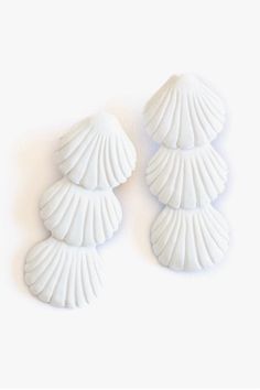 These Sugar Cane Shell Drop Earrings are made from natural materials in Vietnam. They feature a 3" x 0.3" design and are ideal for any casual or coastal outfit. The light material and neutral color make them versatile enough for everyday wear. Sunshine Tienda Seashell Earrings, Sugar Cane, Resort Collection, Beach Jewelry, Walk On, A Walk, Natural Materials, Neutral Colors, Amazing Jewelry