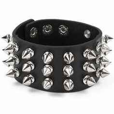 Skeleteen Spike Faux Leather Cuff is a great costume accessory for Halloween or dress-up. This bracelet is 9" long and has 3 different sized closures to ensure a secure fit for every wrist. These Studded Bracelets are of the ideal 80s rock star style and can be used for Rockstar costumes. Skeleteen items are made of tested materials that are non-toxic and safe. Dabi Clothes, Punk Clothing Style, Emo Items, Spikey Bracelets, Rockstar Accessories, 80s Bracelets, Rockstar Bracelet, 80s Rock Star, Spiky Bracelet