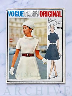 Vogue Paris Original 2190; ca. 1969; Pierre Cardin - Misses' One-Piece Dress. Semi-fitted flared dress with bias side sections has cap sleeves. Bias corded standing neckline, sleeve band and hem band. CONDITION // Size 8 Bust 31.5 Waist 23 Hip 33.5 Envelope is in excellent vintage condition with minimal wear and pen marking on front. Pattern is new old stock uncut in factory folds, complete with instructions included and is shipped in a custom sized protective plastic sleeve (also available for 60s Vogue, Dresses 60s, Simplicity Dress, Vogue Dress, Stand Up Collar, Womens Sewing Patterns, Dress Short Sleeve, Vintage Vogue, Sewing Pattern Design