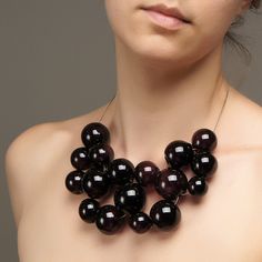 "This Black chunky necklace is made of glass in the lampwork technique, each bead is hand blown and unique. This Black bib beaded necklace is lightweight, stylish and elegant and will become a versatile and irreplaceable addition to your everyday outfits! 💕 You will definitely look stunning in this glass bubble necklace! Dimensions: the necklace length is adjustable, 16 1/2\"-19\" inch (42-48cm). Materials: artist lampwork glass beads, metal fittings. 🎁 This big bead necklace will also be a gr Black Glass Jewelry With Large Beads, Black Glass Beaded Necklaces With Round Beads, Black Glass Beaded Necklace With Round Beads, Black Glass Bead Necklace, Modern Black Round Beads Necklace, Modern Black Necklace With Round Beads, Black Round Bead Bib Necklaces For Party, Unique Black Beaded Necklace For Party, Modern Black Glass Jewelry