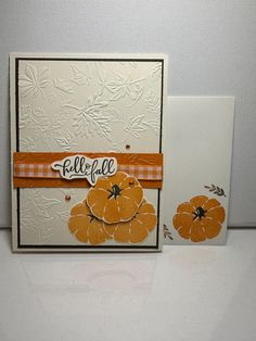 two cards that have been made to look like pumpkins