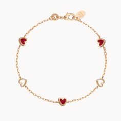 A symbol of love beyond any words. Our Valentines Chain Bracelet is a heartfelt gesture of love in jewelry form. Each bracelet features a chain of mini hearts to add a pop of romantic red and affection into any bracelet stack.&nbsp;18K Champagne Gold PlatedBracelet measures 7, adjustable to 6.3Sent with love in a complimentary gift box Rose Gold Adjustable Chain Bracelet For Valentine's Day, Valentine's Day Rose Gold Adjustable Chain Bracelet, Heart Charm Bracelets For Valentine's Day, Heart Charm Bracelets For Valentine's Day Promise, Valentine's Day Promise Bracelets With Heart Charm, Valentine's Day Promise Bracelet With Heart Charm, Valentine's Day Rose Gold Heart Bracelet With Jubilee Detail, Valentine's Day Gold Jubilee Bracelet, Red Dainty Heart Charm Bracelet