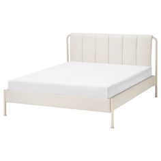 a white bed frame with no sheets on it