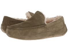 UGG Ascot (Moss Green) Men's Slippers. Step into pure comfort with this perennial favorite. Leather or suede upper in a slip-on silhouette. Water-resistant Silkee suede upper in a slip-on silhouette. Fully lined with UGGpure. Fit should be snug  but not uncomfortable. Footwear will give a little as fleece footbeds form to each individual's foot. Molded rubber outsole. Durable gum rubber outsole. From the Ugg Home/Spa Collectio #UGG #Shoes #ClosedFootwear #Slipper #Green Uggs For Cheap, Women Working, Mens Uggs, Low Income, Moss Green, Childrens Shoes