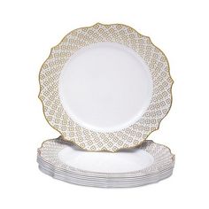 six white and gold plates stacked on top of each other