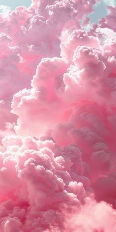 the sky is filled with pink clouds