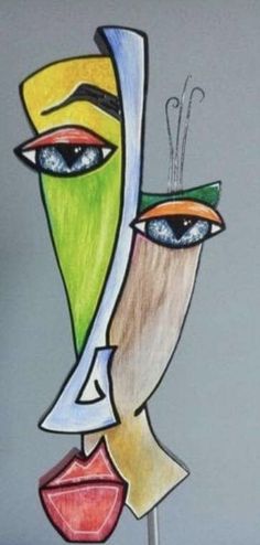 a drawing of a woman's face with two different colored faces on top of each other