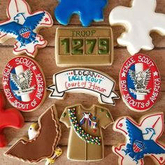 decorated cookies are laid out on a table