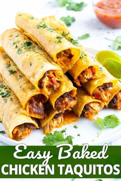 easy baked chicken taquitos on a plate with cilantro