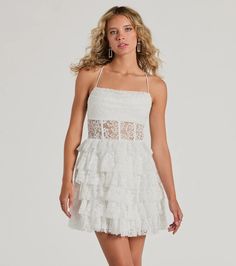 Showcase your eye-catching beauty in the Rochelle formal mini dress, a gorgeous staple for brides-to-be! Crafted with airy sheer lace fabric with a partial knit lining, she brings that effortlessly chic allure and feminine charm. She features a sleeveless cowl neckline with pleated detailing and a built-in padded bust, adjustable spaghetti straps that lead to an open cross-back design, a stunning sheer corset-inspired waist with flexible boning for structure, and a tiered ruffled A-line silhouet Fitted Lace Trim Mini Dress For Homecoming, Elegant Lace Trim Mini Dress For Homecoming, Lace Mini Dress For Homecoming, Glamorous Summer Mini Dress With Lace Trim, Summer Homecoming Dresses With Lace Trim, Elegant Mini Dress With Lace Trim, Lace Trim Mini Dress For Homecoming, Glamorous Mini Dress With Lace Trim, Glamorous Lace Mini Dress