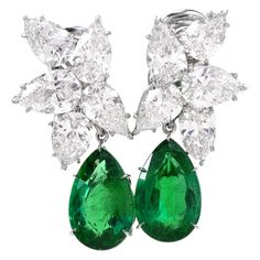 You too can walk the Red Carpet! These Extraordinary Diamond and Emerald earrings were handcrafted in Luxurious Platinum and inspired by a floral motif extremely similar in style to those worn by Jennifer Lopez on the Red Carpet in 2019 that Alex Rodriguez had gifted her for Christmas. Two Genuine Pear shaped vibrant emeralds (detachable) dangle freely weighing approx: 6.97carats and 7.07 carats, totaling 14.04 carats. Both are GIA graded to be a natural beryl. The Emerald drops measure 16.66 x 10.84 x 6.77mm, and 16.72mm X 10.71mm X 6.56mm. Total 10 diamonds weight is 14.64 carats. Diamond weight ranges from 1.82 carat to 1.16 carats. each individually comes with GIA Lab Report. All color are D, E, and F color, and the clarity are two VVS1, one VVS2 clarity, two VS1, one VS2, three SI1, a Alex Rodriguez, Luxury Earrings, Jewelry Appraisal, Diamond Dangle Earrings, Expensive Jewelry, Emerald Earrings, On The Red Carpet, Antique Diamond, Antique Earrings