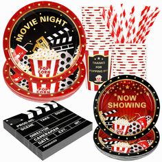 movie night party supplies including paper plates, napkins and popcorn cups with red and white striped straws