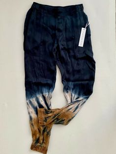 New with defects ( light thread pull at top of pants ) selling as is Waist 13" flat Rise 9.5" 29" Inseam Viscose/Rayon Dye Pants, Tie Dye Pants, Viscose Rayon, Pants Blue, Cargo Shorts, Blue Brown, Mens Short, Tie Dye, Thread