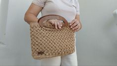 Elevate your style with our Handmade Crochet Bag.  Perfect for every occasion, this chic woman accessory blends boho charm with casual fashion 🌸.  Handcrafted with care, it's a unique statement piece that celebrates individuality.✨  Size is approximately 12x8 inc Care Instructions ➛ Spot clean with a damp cloth and mild soap as needed. ➛ Avoid submerging in water or machine washing. ➛Avoid prolonged exposure to direct sunlight to prevent fading. 🚀🚀 I ship your order 1 or 2 business days after Handmade Crochet Bags, Crochet Purse, Top Handle Bags, Modern Gift, Boho Crochet, Crochet Purses, Handmade Boho, Chic Woman, Mild Soap