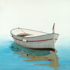 a small boat floating on top of a body of water