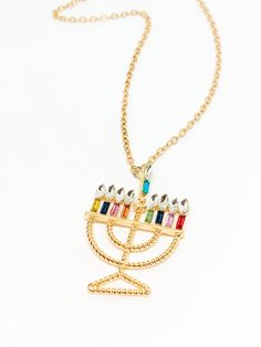 Made in Portland, Oregon. I’ll be honest I was always jealous of all the cute Christmas jewelry out there, so like any good entrepreneur I made my own Hanukkah line! Enjoy, share and have some fun this holiday season! MEASUREMENTS + MATERIALS - Length comes in 18, 20 or 22 inches and is adjustable another 2 - Menorah is about 1.8 inches wide - Sparkly rhinestones and enamel to help you celebrate the season - Gold plated chain for sensitive skin (hypoallergenic) - Other designs available! WHAT PE Menorah, Christmas Jewelry, Be Honest, Cute Christmas, Gold Plated Chains, Have Some Fun, Portland Oregon, Hanukkah, Some Fun