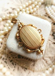 "Beautiful French Antique c1900s Gold Plated Ornate Victorian Locket Antique Photo Holder Pendant, Gift for Woman Size -  Medallion itself (inside of an inner oval part - place for a photo, without a frame) - approx. 23,5x16,5mm / 0,92\" x 0,65\" Size without a bail (with decorative frame) - approx. 42,5x28,7mm / 1,67\" x 1,13\" Total lenght (with bail) - approx.  53mm / 2,08\" Width - approx. 6,5mm / 0,25\" Pendant is in a great antique condition, very thick and high quality, gold plated, shiny and beautifully decorated with a big ornate frame. Inside it has a place to hide two photos or maybe dried flowers, piece of fabric, little painting..  Pendant has a few signs of age, as you can see on photos, especially on the back - some scratches and a delicate gold layer wear, but overall it's Antique Victorian Jewelry, Victorian Items, Vintage Gold Pendant, Vintage Locket Necklace, Gold Photo Frames, Victorian Locket, Vintage Wedding Jewelry, Antique Locket, Edwardian Jewelry