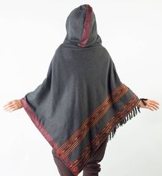 Meet Our Handmade High Quality Cashmere Yak Wool Poncho . . . Featuring beautiful tribal celtic embroidery . . . it has a large hood and two pockets . . . One size fits all . . . For measurements and sketch see last photo . . . ~~~~~~~~~~~~~~~~~~~~~~~~~~~~~~~~~~~~~~~~~~~~~ Measurements: From neck to tip 88cm (35 inches) Hood size 37cm (15 inches) ~~~~~~~~~~~~~~~~~~~~~~~~~~~~~~~~~~~~~~~~~~~~~ Traditional Winter Poncho, Traditional Embroidered Winter Poncho, Traditional Embroidered Poncho For Winter, Traditional Festival Poncho With Woven Motifs, Winter Festival Embroidered Poncho, Festival Black Embroidered Poncho, Traditional Brown Poncho For Festival, Traditional Cotton Poncho For Festival, Celtic Embroidery