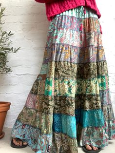 This gorgeous colourful gypsie skirt is all fun to wear, boho inspired long and flowy it is patchwork design, made of varieties of fabrics with different floral prints and it is true hippie girl style skirt It has comfortbale elasticated waist band to fit most of sizes ( S-L) perfect outfit for everyday and evenings out or travels and festivals You can wear it all year round with jumper and thights PRODUCT SIZE One Size Fits Most length 39 inch/100 cm waist 14-16 inch /37-44 cm MATERIAL * Silk * Patchwork Skirt, Hippie Girl, Floor Length Skirt, Tier Skirt, Patchwork Designs, Free Size, Tie Dye Skirt, Skirt Fashion, Perfect Outfit